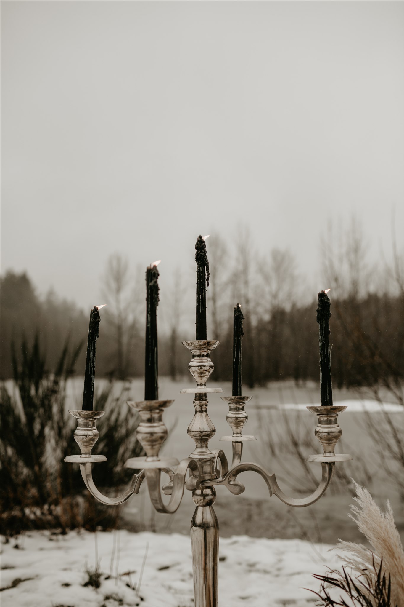 Winter wedding tablescape with silver candelabra