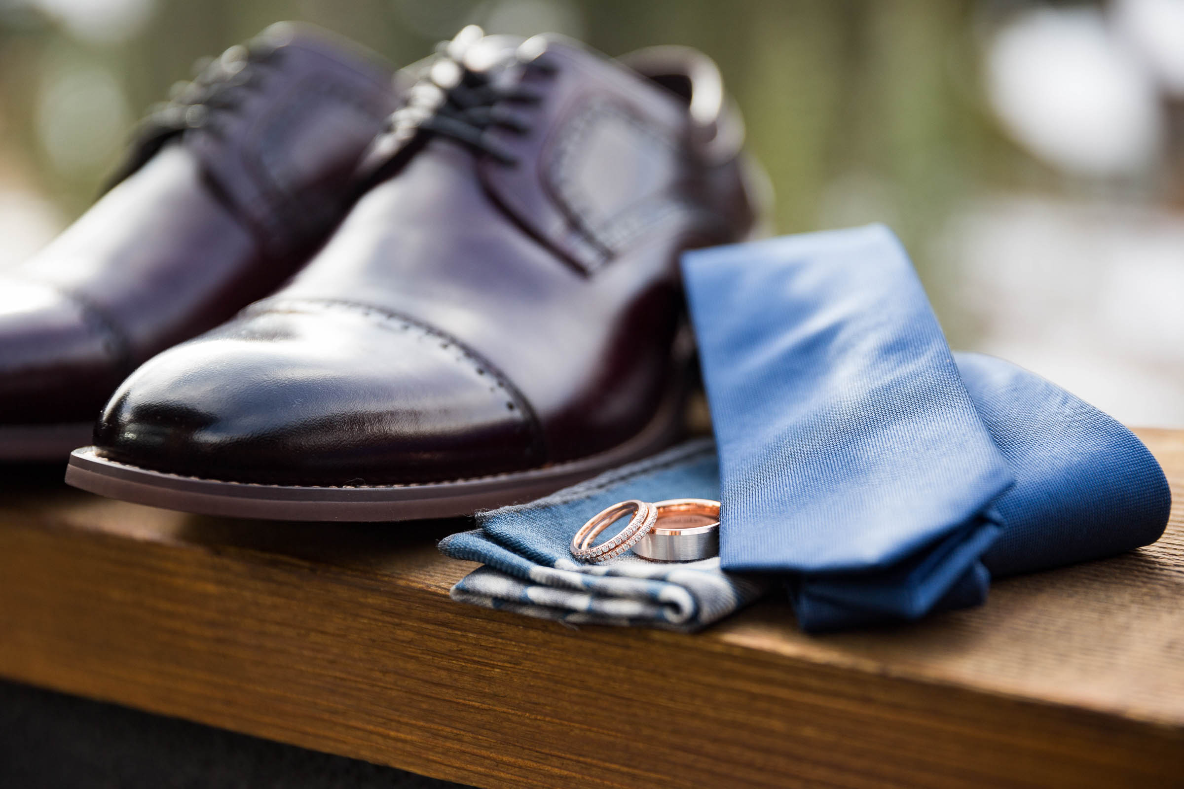 Grooms dark shoes and cobalt blue tie