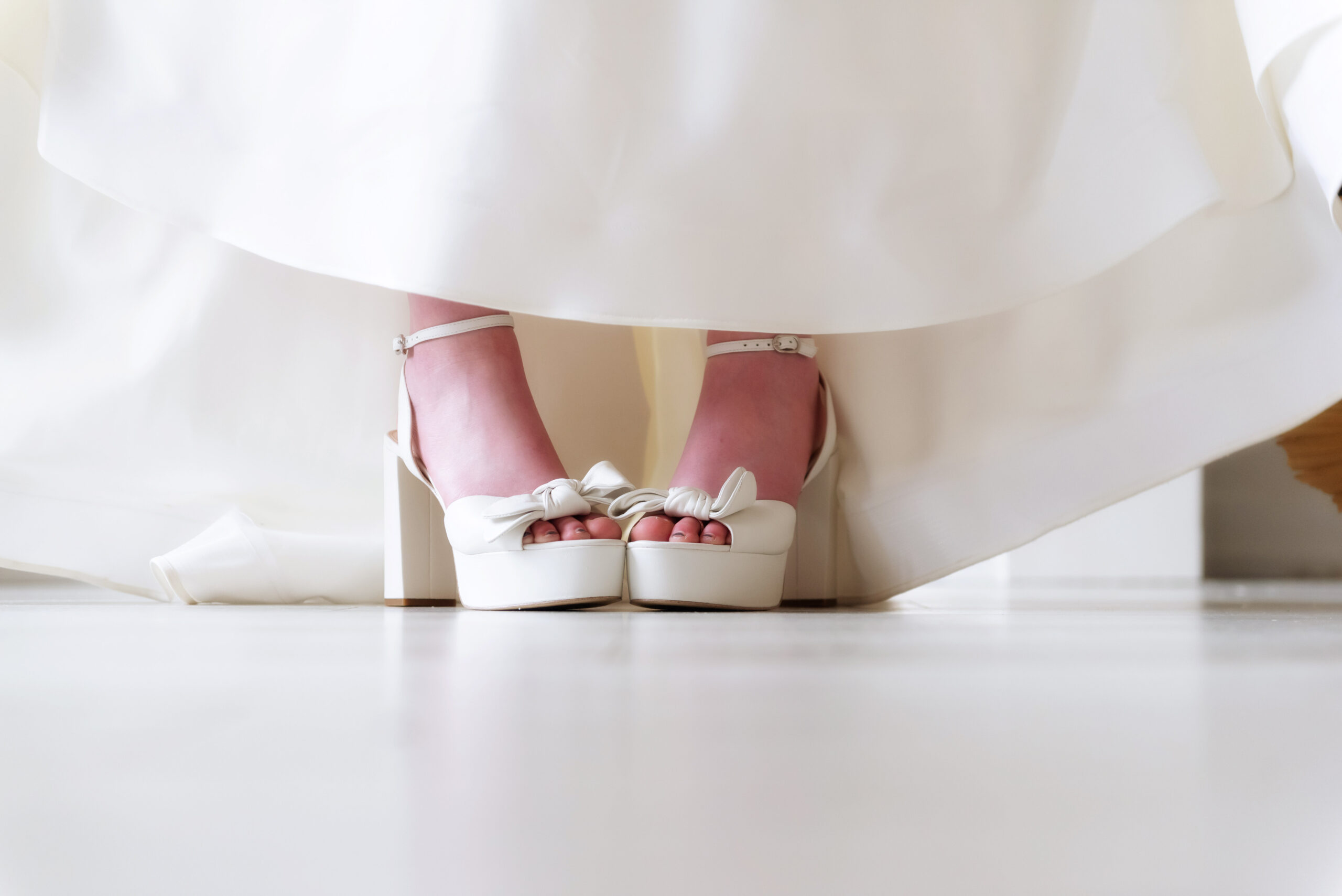 Wedding shoes with cute white bows