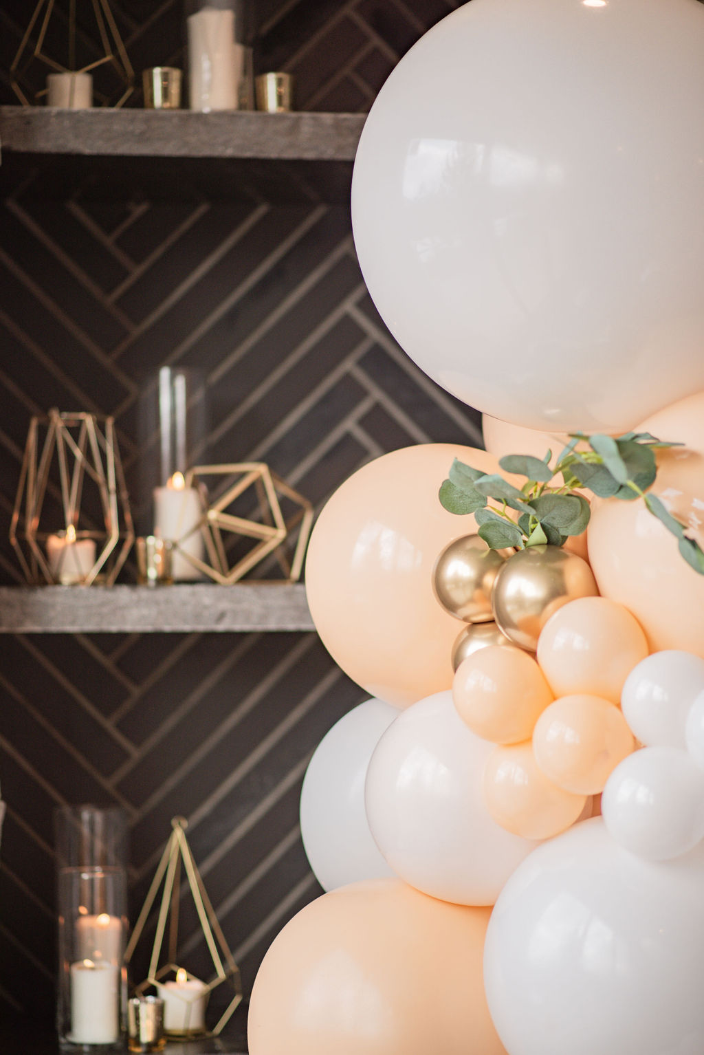 Peachy and Ivory wedding balloon against a black backdrop