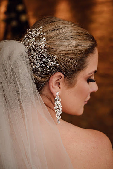 Classic bridal chignon with crystal sparkling hair jewellery and long veil