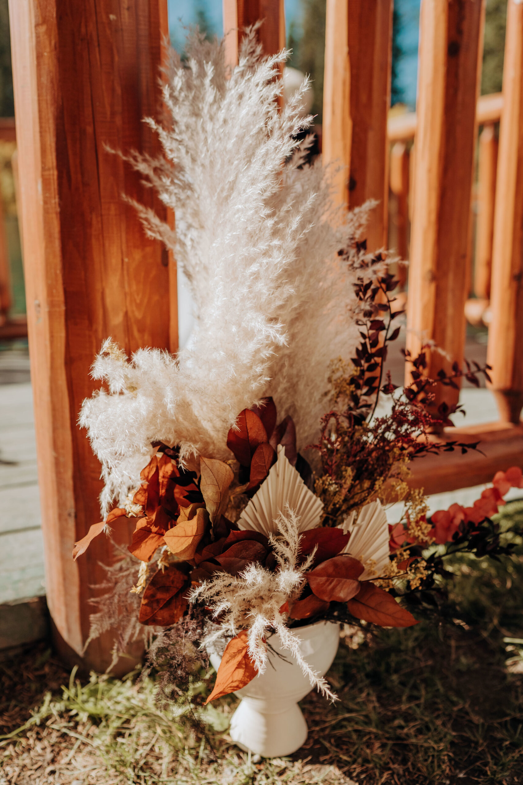 Boho white feather wedding decor for wedding ceremony