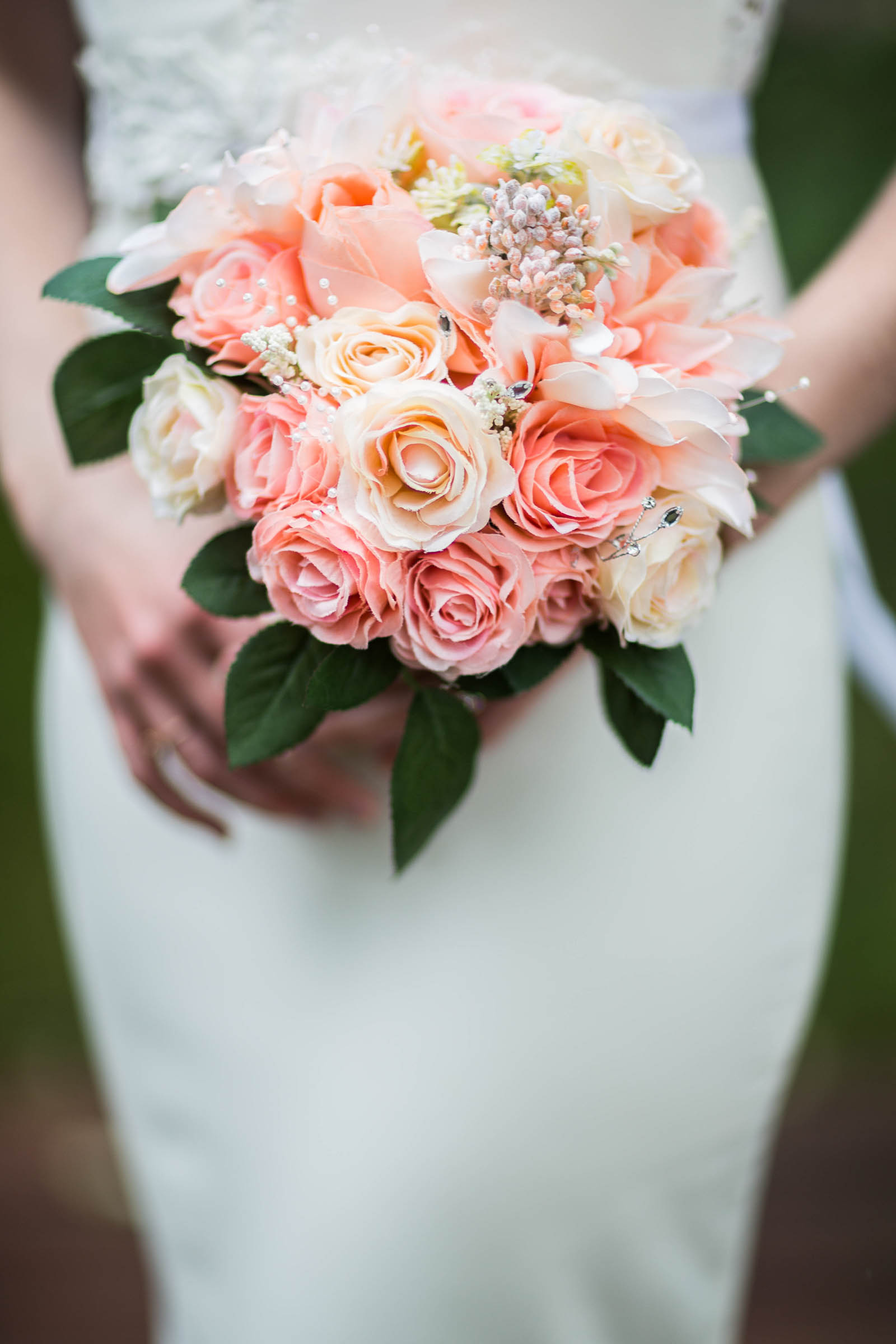 Bride holding pink bouquet