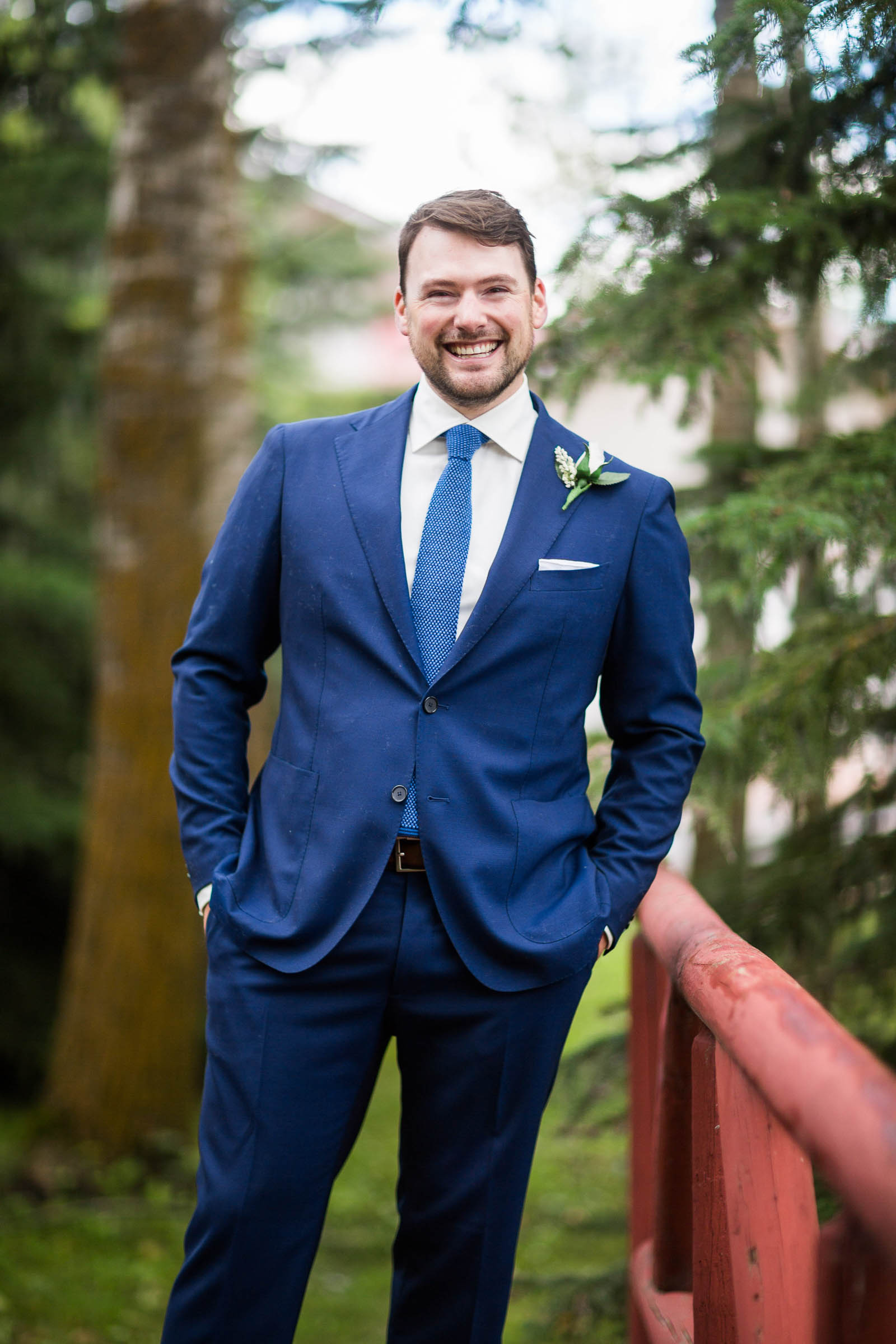Groom in cobalt blue wedding suit