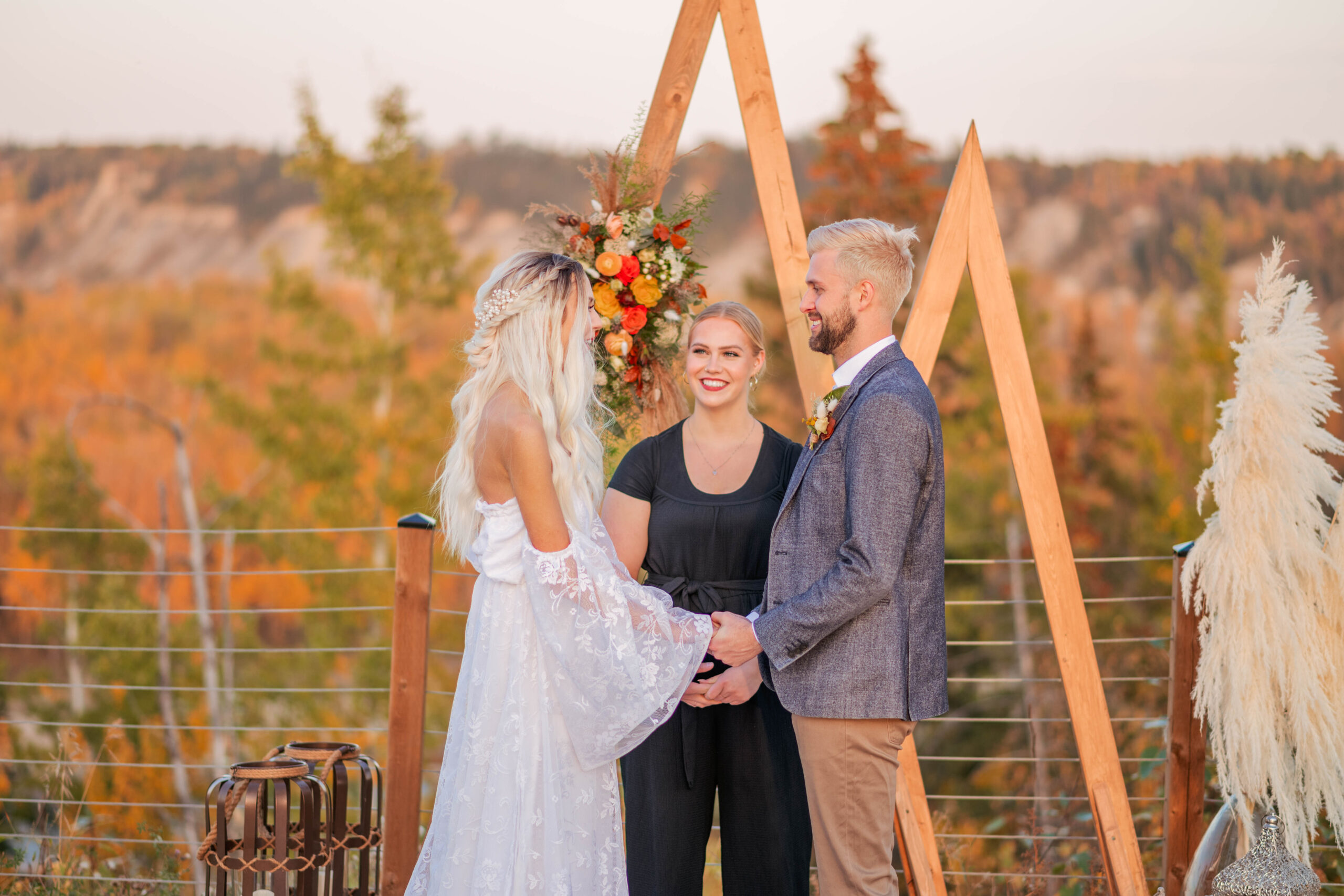 bride and groom at altar with minister